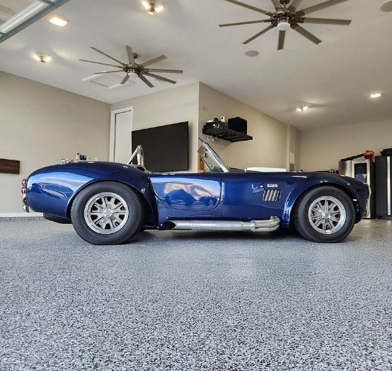 Blue car on epoxy floor